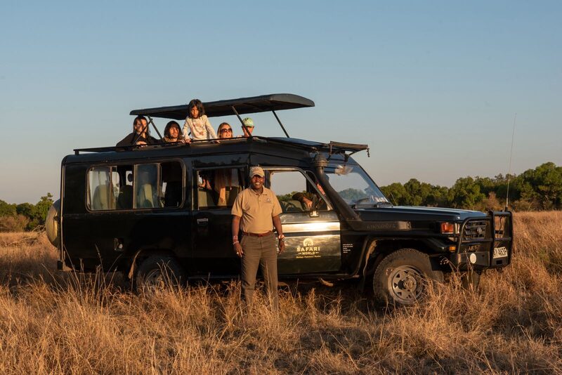 Safari World guide with a group of guests on safari